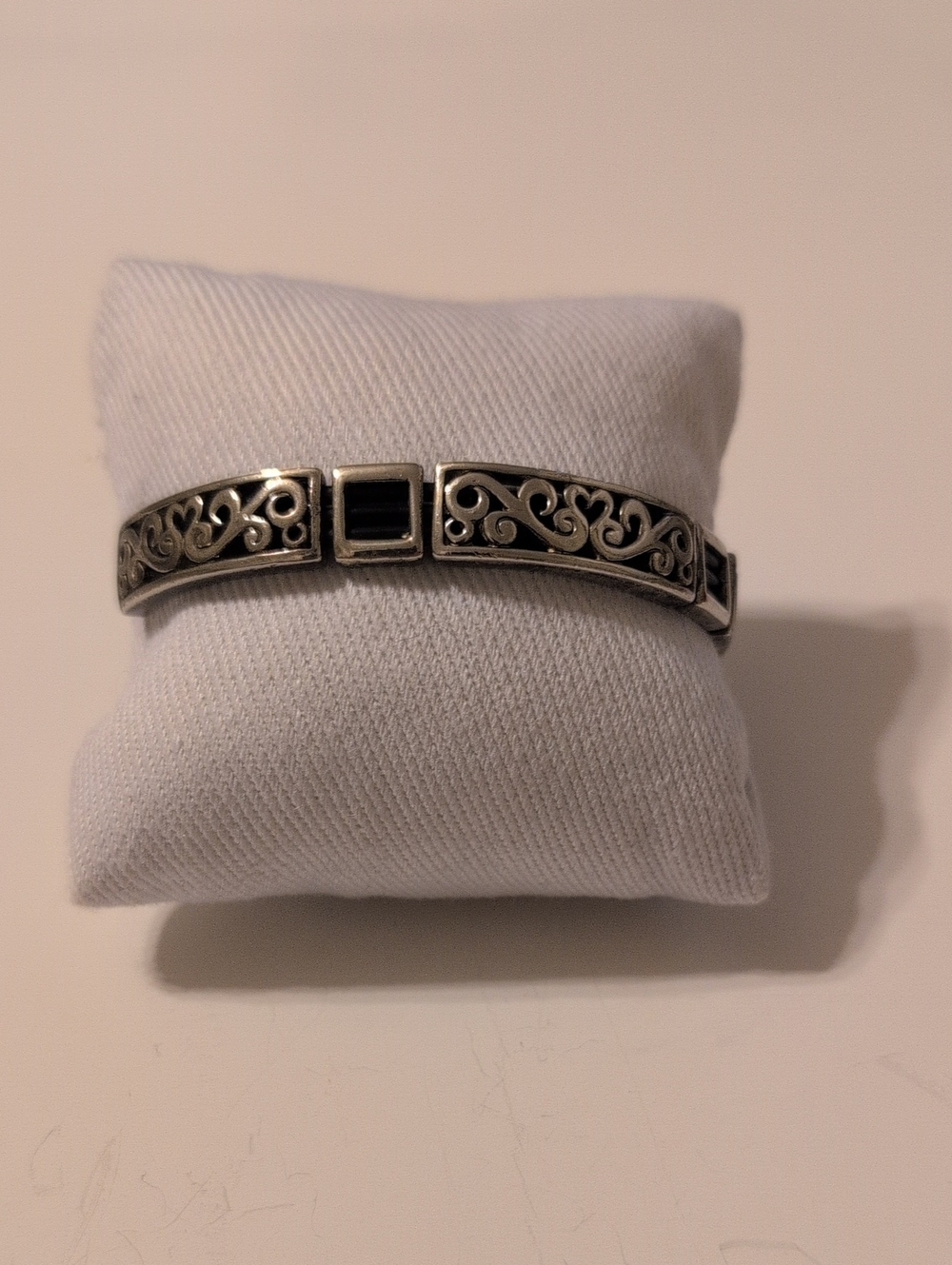 Silver Scrollwork Bracelet with Black Stones